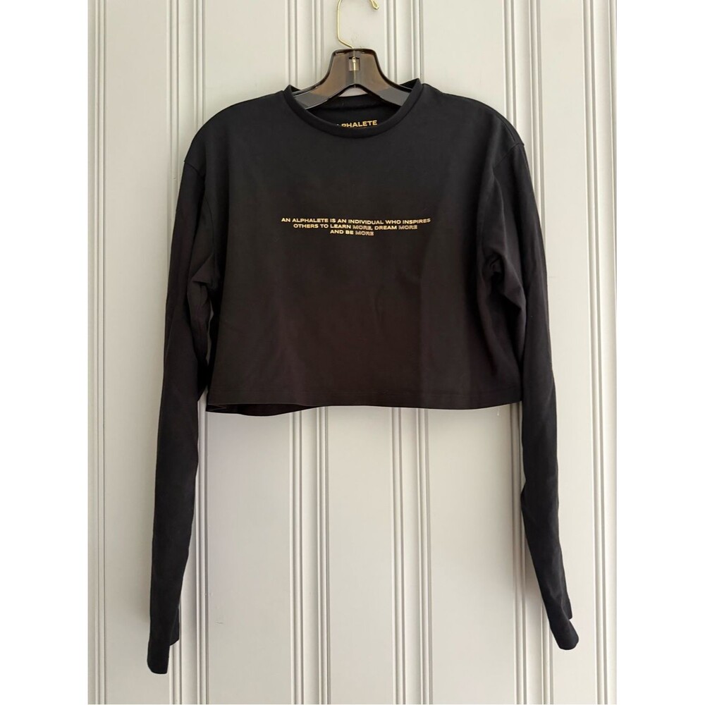 Alphalete Black Cropped Long Sleeve Top with Gold Chest Text